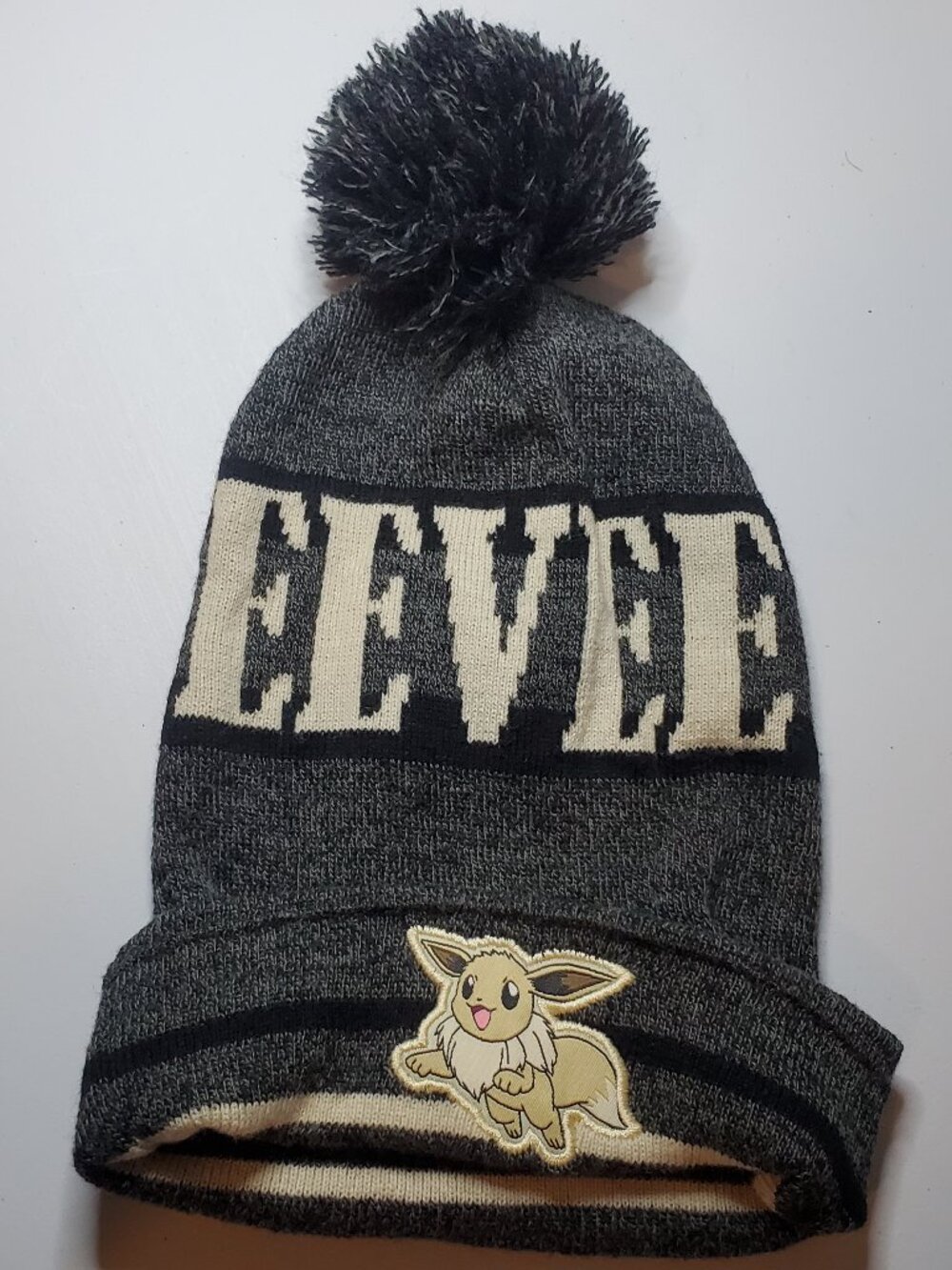 Pokémon Bioworld Eevee Pom Beanie Hat Grey/Black